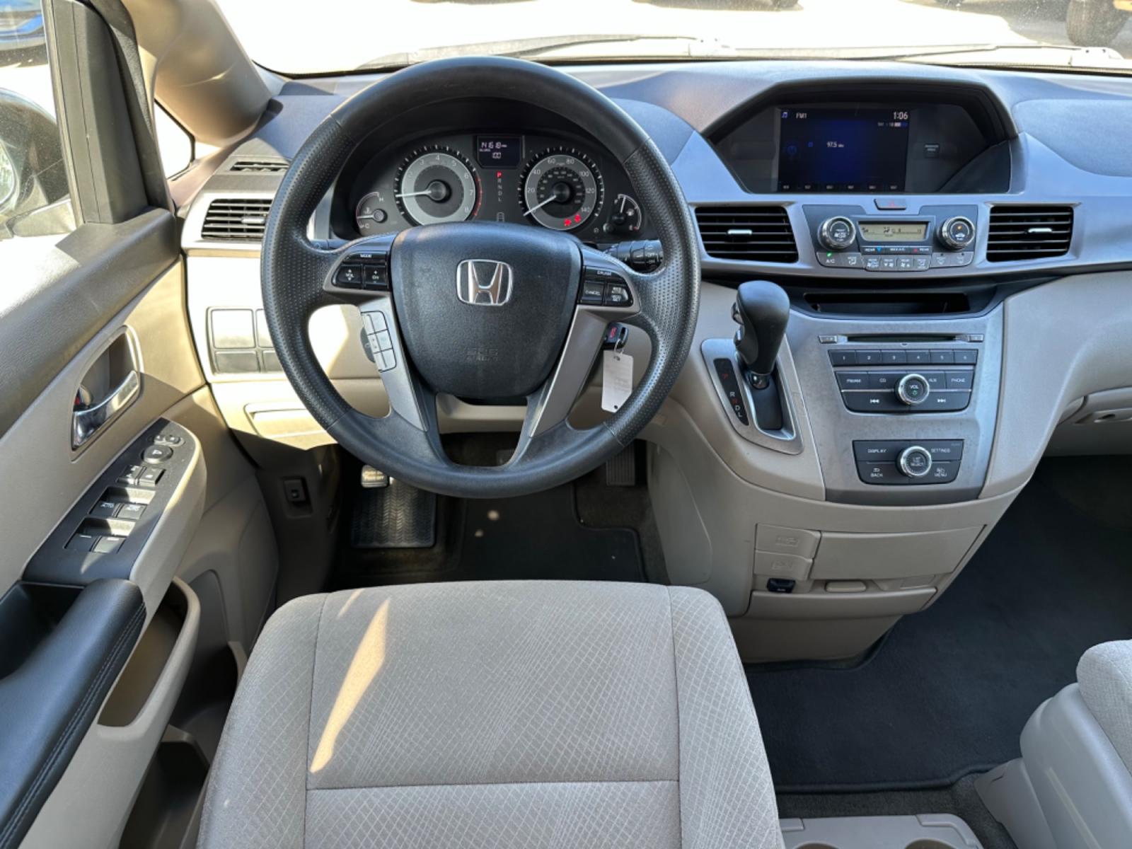2014 White /Beige Honda Odyssey LX (5FNRL5H29EB) with an 3.5L V6 SOHC 24V engine, 6-Speed Automatic transmission, located at 1501 West 15th St., Houston, 77008, (713) 869-2925, 29.797941, -95.411789 - Photo #8